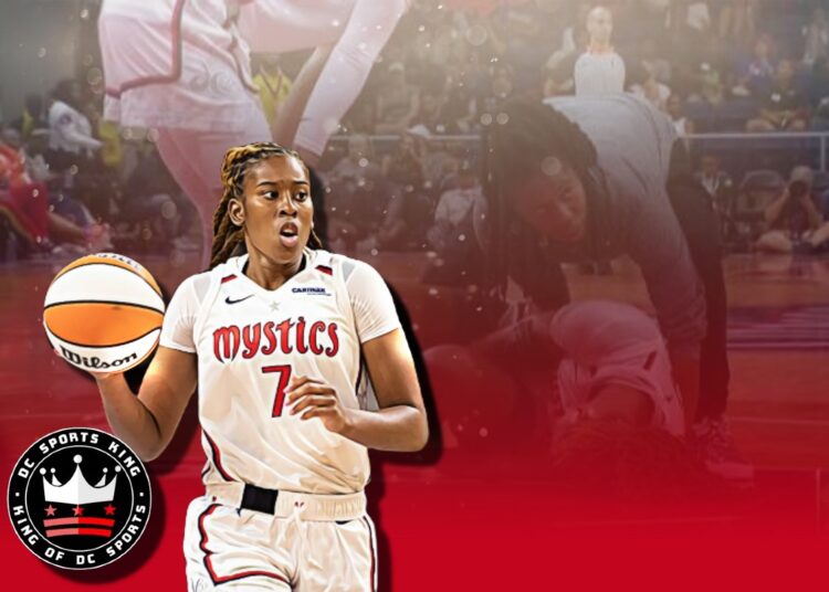 Ariel Atkins carted off court after breaking Mystics' three-point record